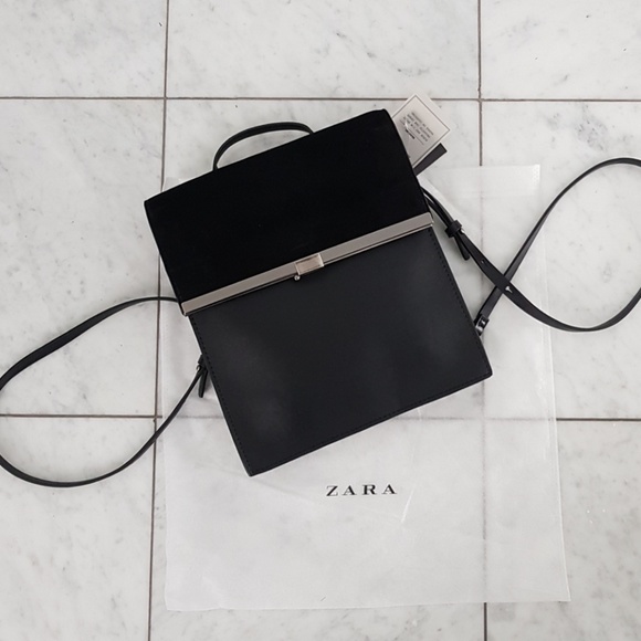 Zara Handbags - ZARA SLEEK LEATHER BACKPACK WITH METALLIC DETAIL